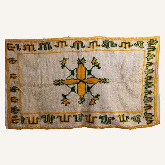 Azilal Moroccan Rug – Golden Star Motif with Green Borders (150 × 250 cm / 5′ × 8′2″)